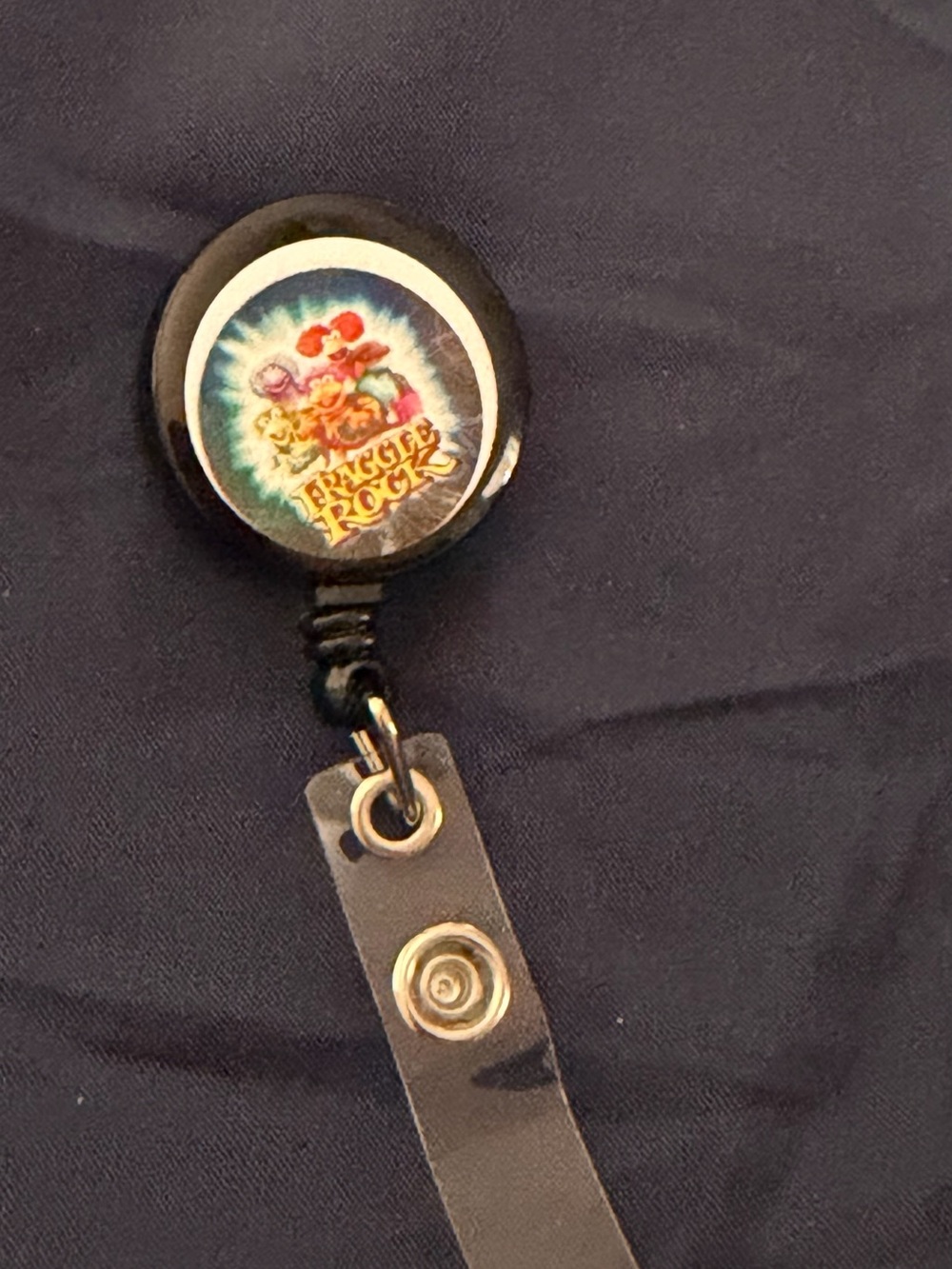Black Retractable Badge Reel with Colorful Fraggle Rock Graphic